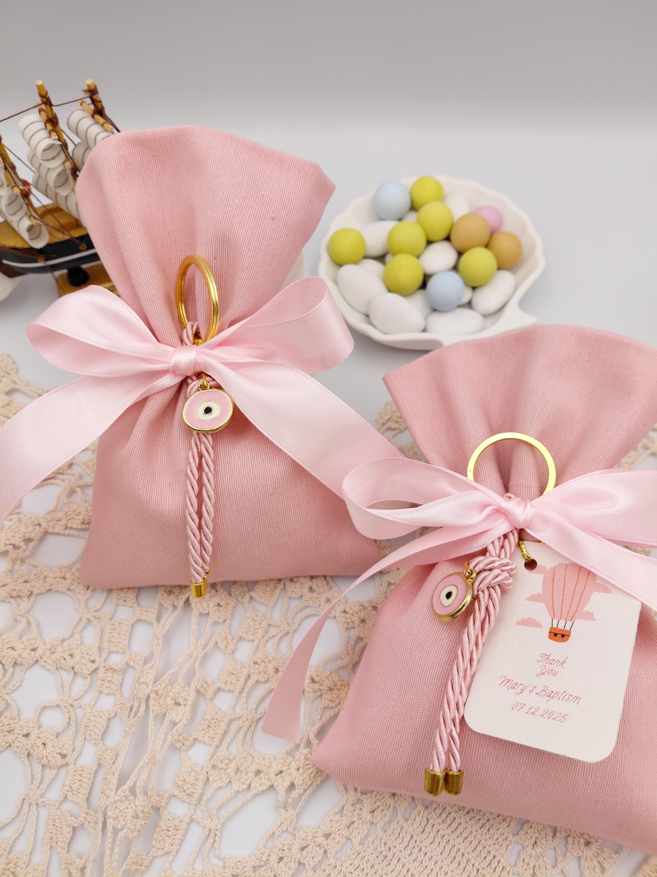 Evil Eye Bomboniere, pink cotton favor bags with Sugared Almonds , Greek Orthodox baptism  Set of 10