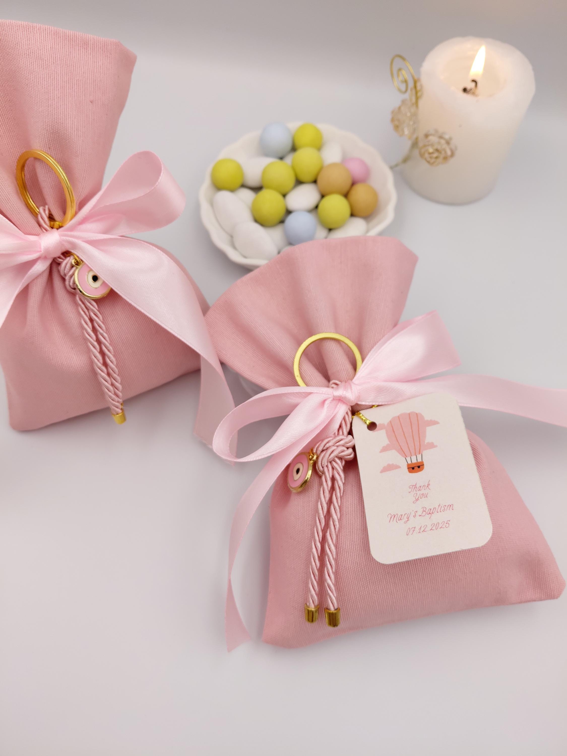 Evil Eye Bomboniere, pink cotton favor bags with Sugared Almonds , Greek Orthodox baptism  Set of 10
