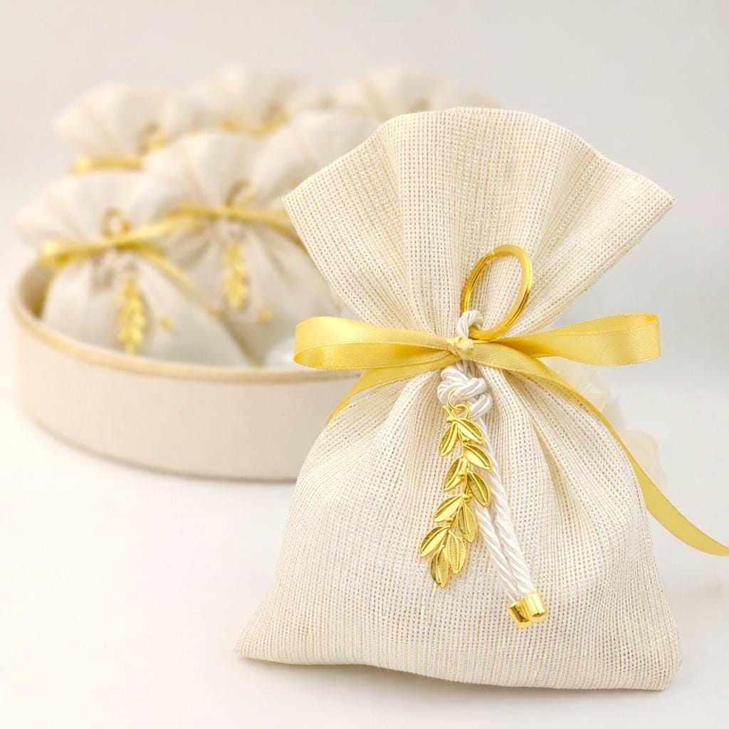 Elegant Wedding Favors – Handmade Ivory Pouches with Gold Olive Leaf Keychains (Set of 10)