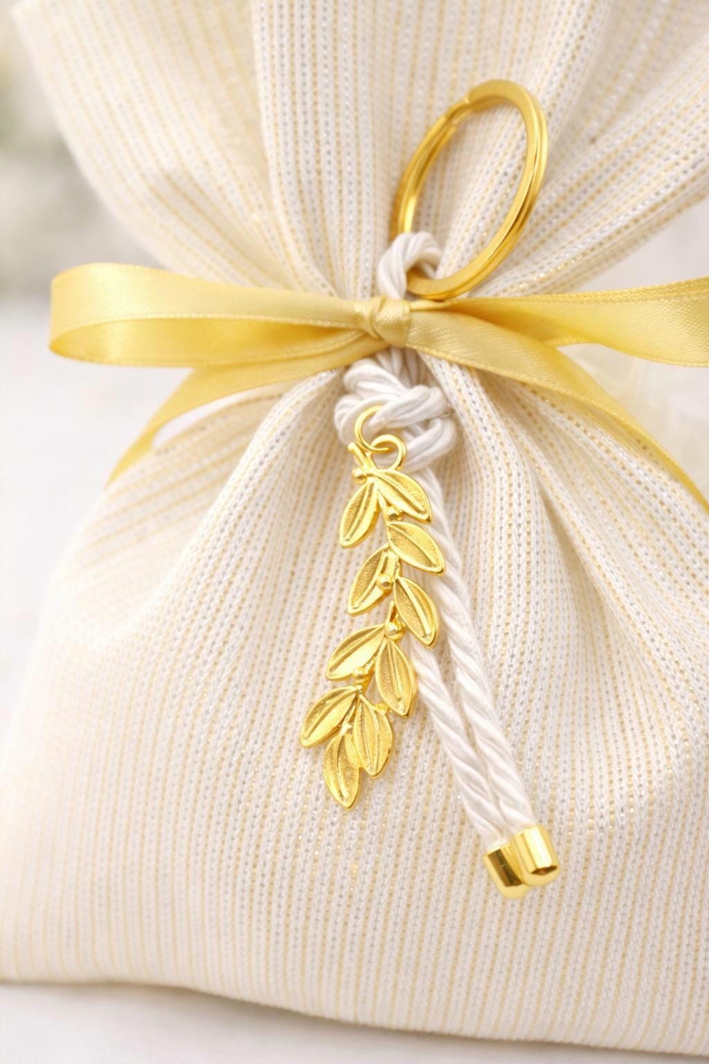 Elegant Wedding Favors – Handmade Ivory Pouches with Gold Olive Leaf Keychains (Set of 10)